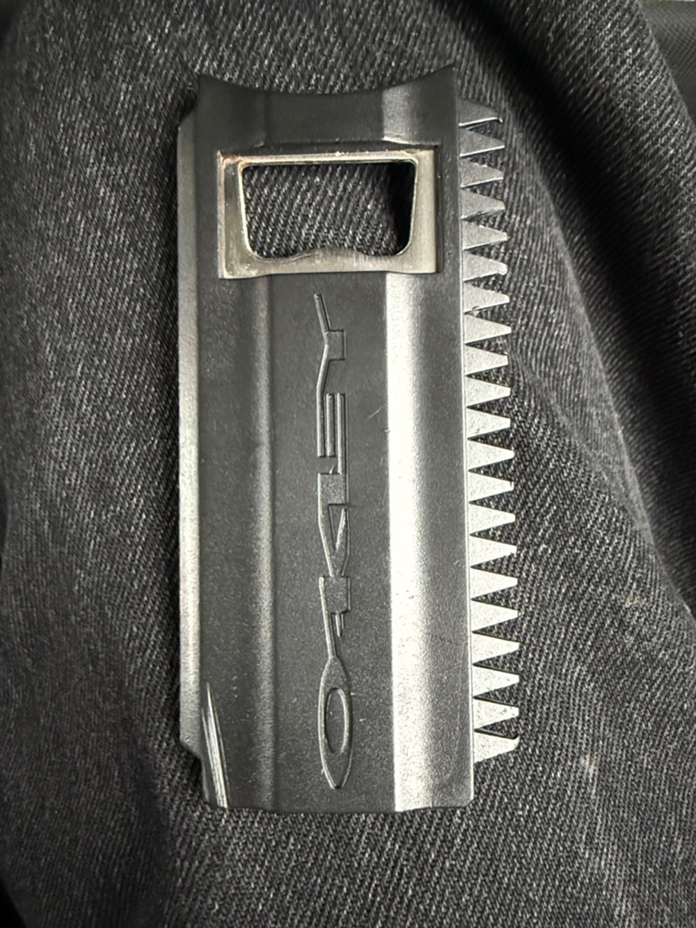 Oakley wax remover and bottle opener
